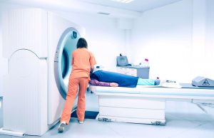 Picture of an MRI machine which is powered by the same phenomenon of nuclear magnetic resonance as NMR spectrometers​